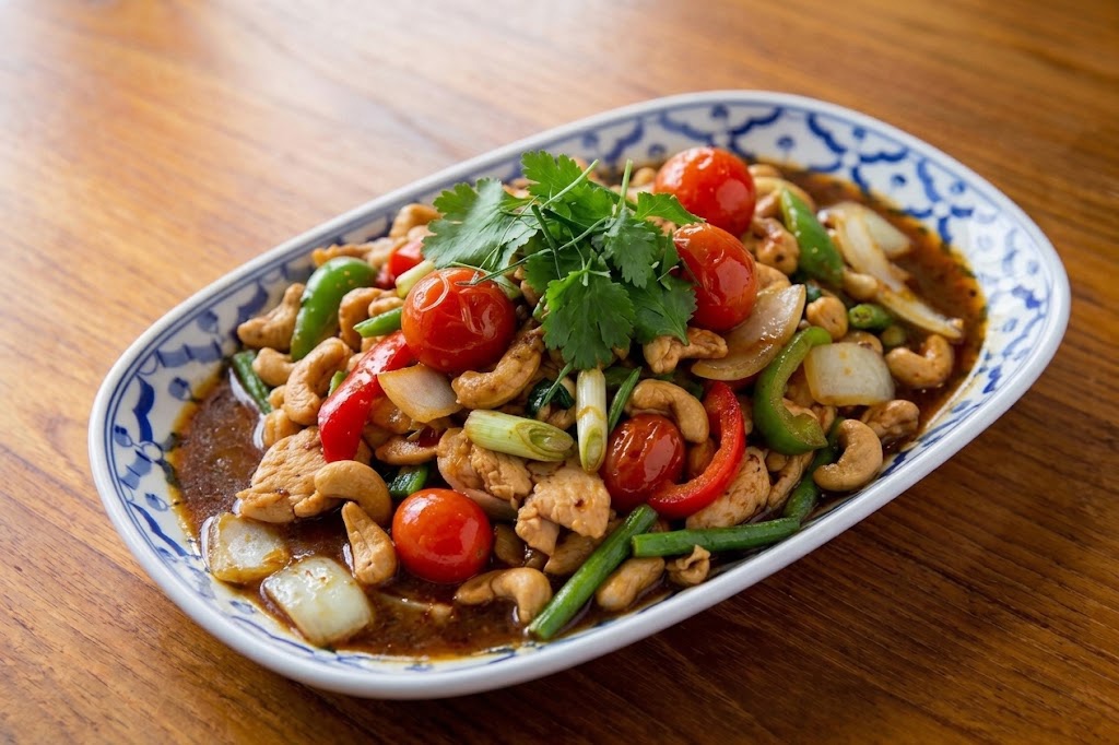 Cashew Chicken — wok-tossed chicken with cashews and chili.